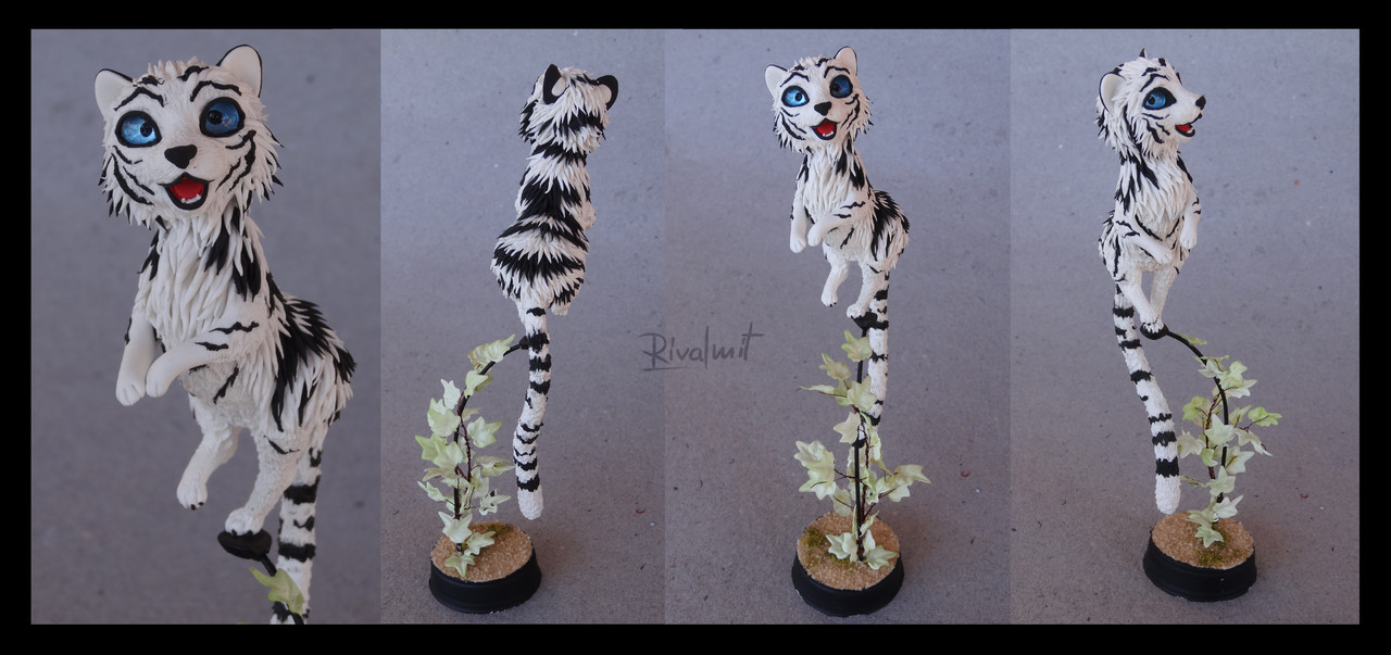 sculpture tiger companion  The little white tiger 