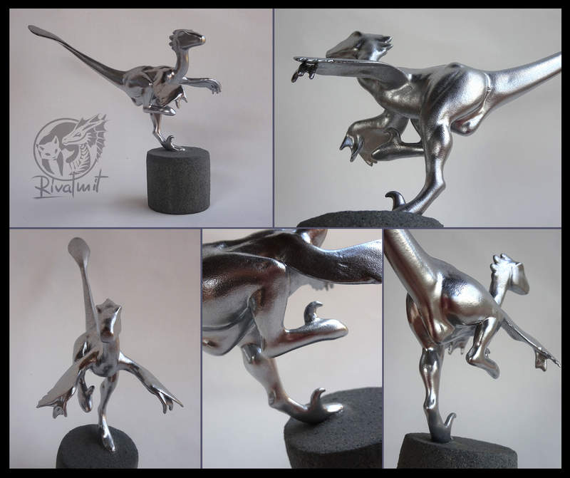 Silver hunter sculpture raptor dinosaur trophy