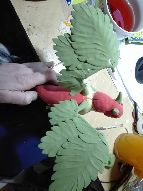  dragon companion sculpture balance ef25 eurofurence furry art strawberry plant Wings done and off to painting 