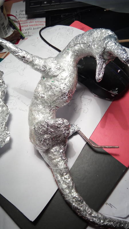  sculpture dragon companion balanced warior war  ef25 eurofurence art From a crumpled alu foil mess, suddenly a becomes a dragon!  ...Oops
