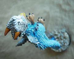 tiny dragon for the other con companion sculpture balanced art dragon bird
