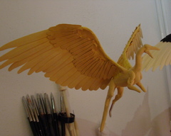 sculpture commission artwork balanced companion dragon  